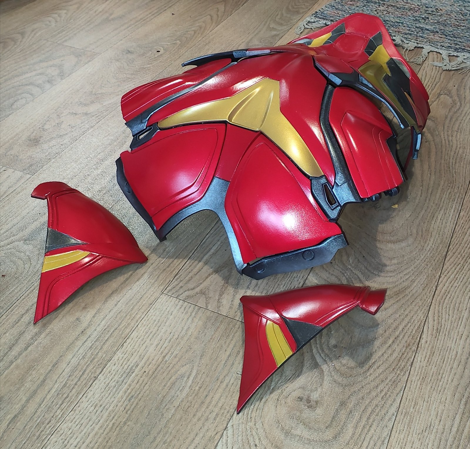 Iron Man MK85 exploded modular armor panels ready for harness mounting
